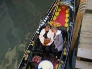 John & Janet enjoy a romantic gondola ride.