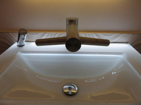 Here is a close up of the sink. The "wings" on the faucet are actually Dyson dryers. 