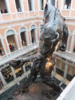 Hirst's "Demon with Bowl" stands 18 meters (59 feet) tall, taking up the entire 3 -story atrium of Palazzo Grassi.
